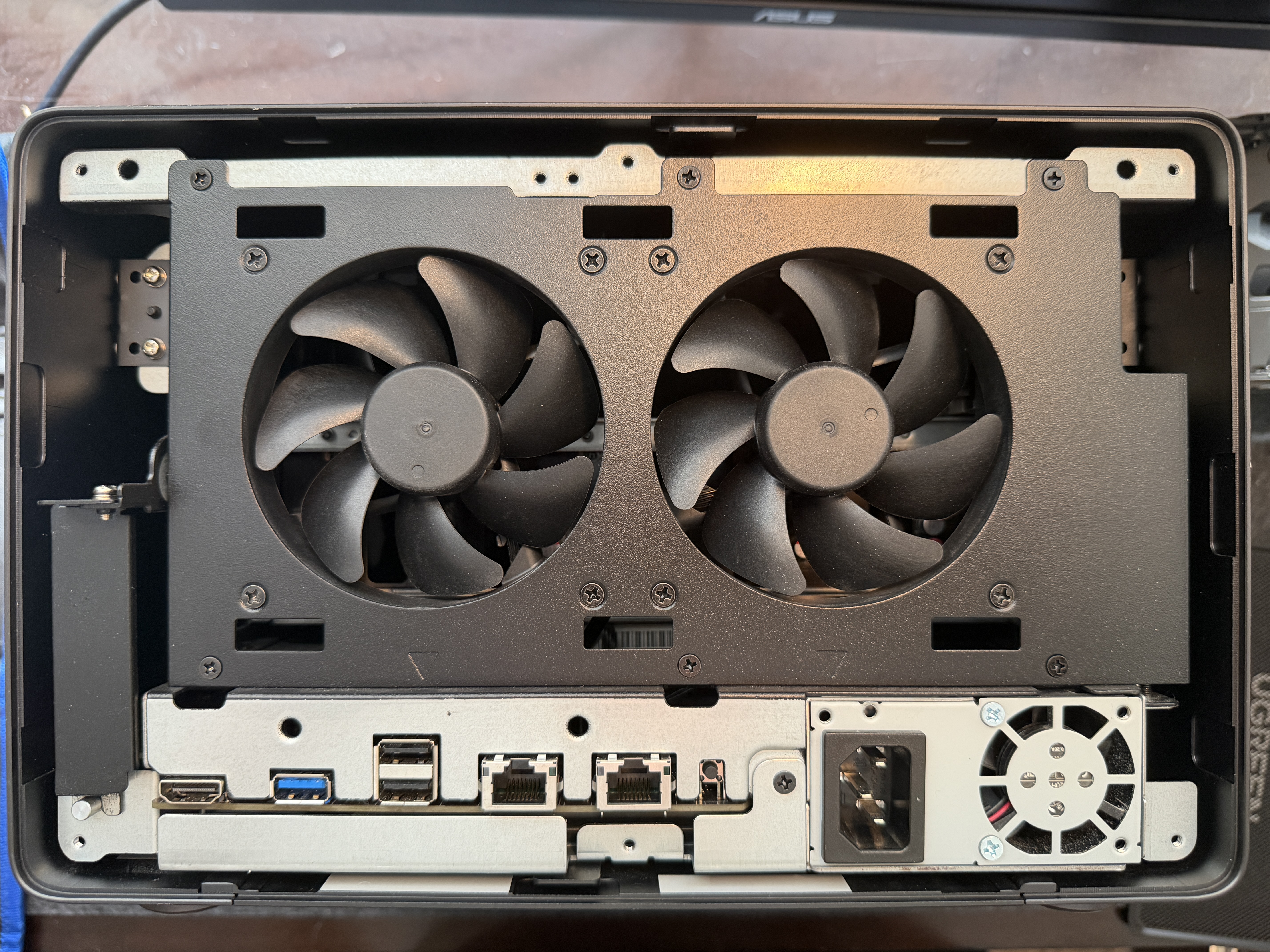 UGREEN DXP6800 Pro with shell removed showing dual 92mm fans and rear I/O panel