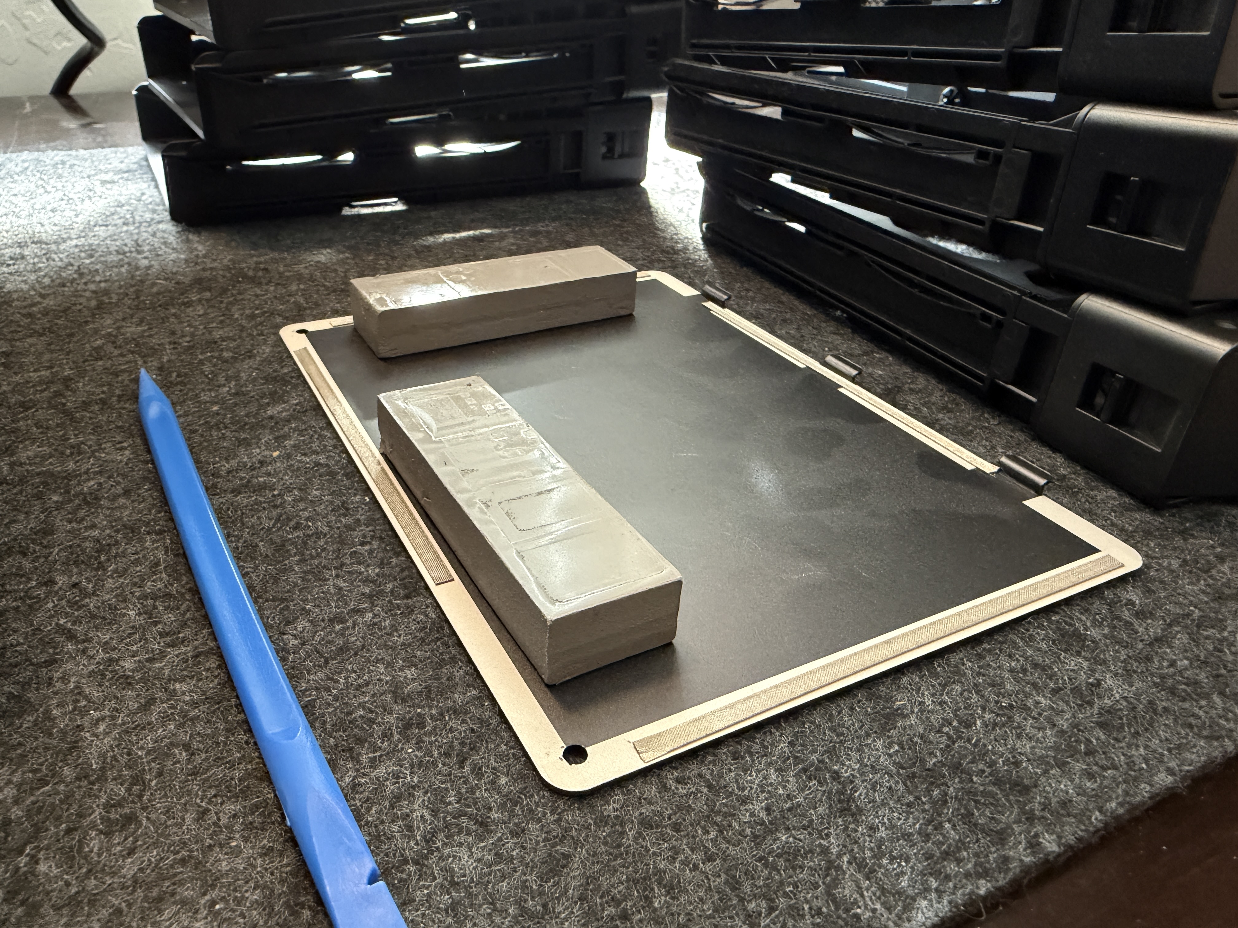 UGREEN DXP6800 Pro bottom panel removed showing large thermal pads for NVMe passive cooling