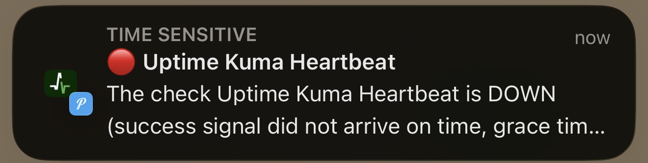 iPhone Pushover notification showing Uptime Kuma Heartbeat check is down from Healthchecks.io