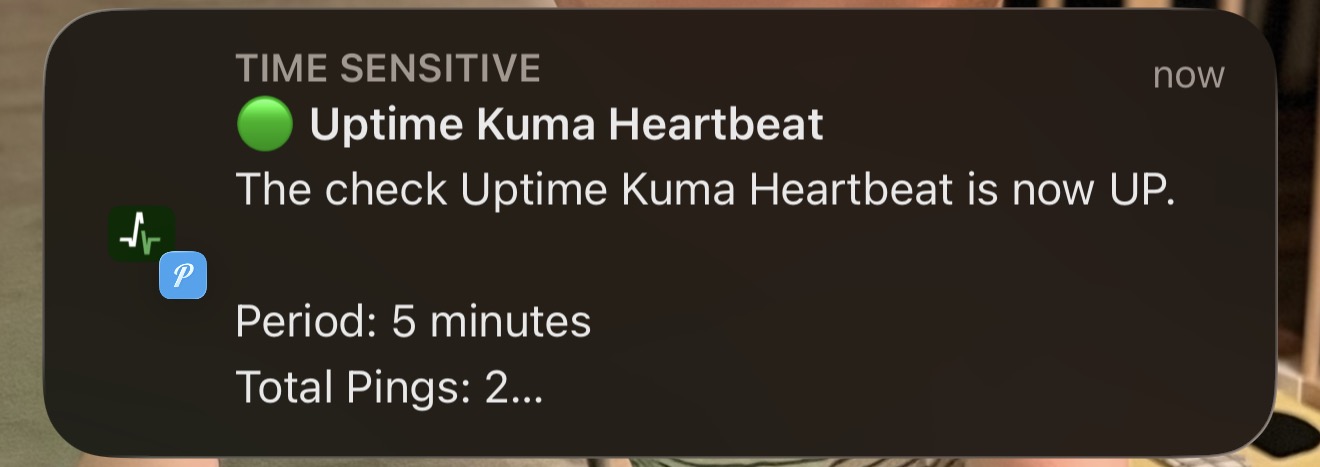 iPhone Pushover notification showing Uptime Kuma Heartbeat check is back up from Healthchecks.io